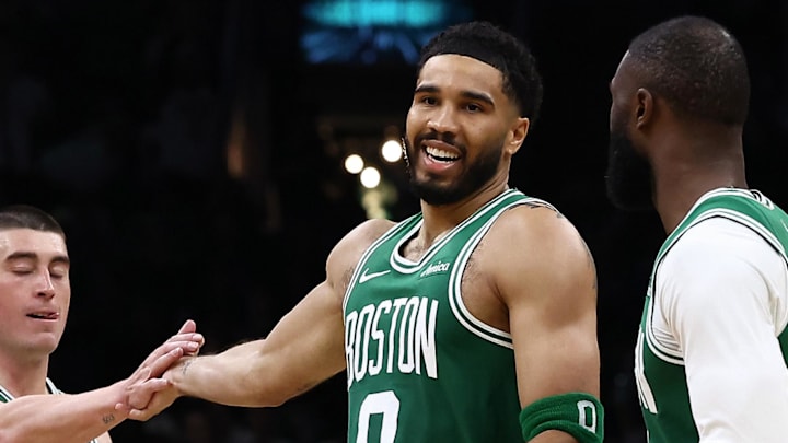 Mar 6, 2026; Boston, Massachusetts, USA; Boston Celtics forward Jayson Tatum (0) smiles at Boston Celtics guard Jaylen Brown (7) while being congratulated by guard Payton Pritchard (11) during the second half at TD Garden. Mandatory Credit: Winslow Townson-Imagn Images