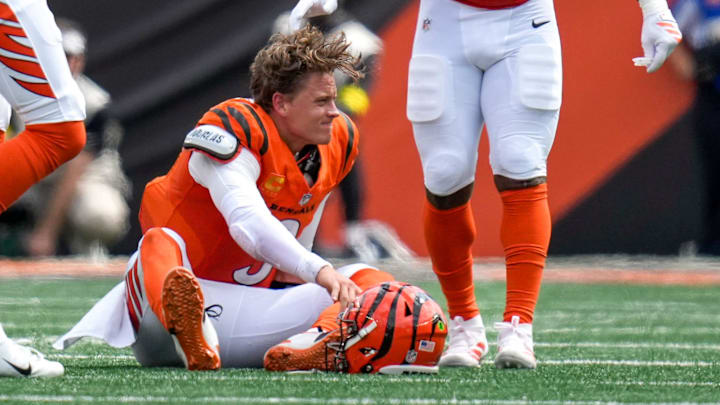 Cincinnati Bengals quarterback Joe Burrow (9) is injured on a play in the second quarter of the NFL Week 2 game between the Cincinnati Bengals and the Jacksonville Jaguars at Paycor Stadium in downtown Cincinnati on Sunday, Sept. 14, 2025. The Jaguars led 17-10 at halftime.