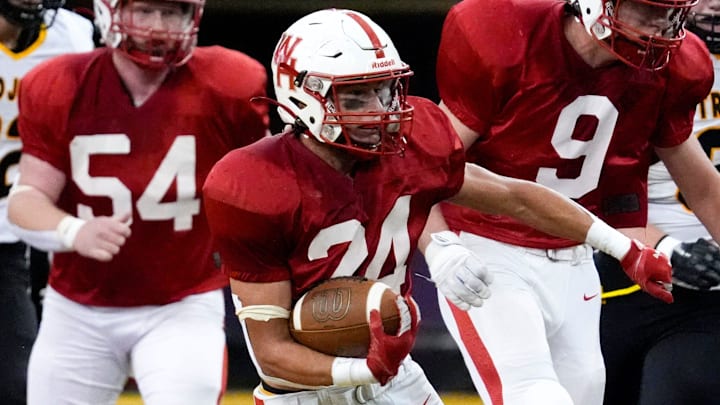 West Hancock Gustavo Gomez (24) carries the ball against Tri-Center during the Iowa high school Class A championship Thursday, Nov. 21, 2024 at the UNI-Dome in Cedar Falls, Iowa.