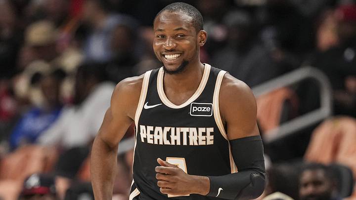 Feb 26, 2026; Atlanta, Georgia, USA; Atlanta Hawks forward Jonathan Kuminga (0) reacts after making a three point shot against the Washington Wizards during the first half at State Farm Arena. Mandatory Credit: Dale Zanine-Imagn Images