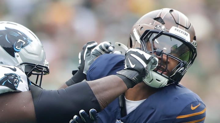 Green Bay Packers defensive end Micah Parsons goes against Carolina Panthers offensive tackle Yosh Nijman (77) on Sunday.