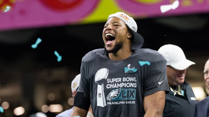 Philadelphia Eagles running back Saquon Barkley (26) celebrates after defeating the Kansas City Chiefs during Super Bowl LIX at Ceasars Superdome.