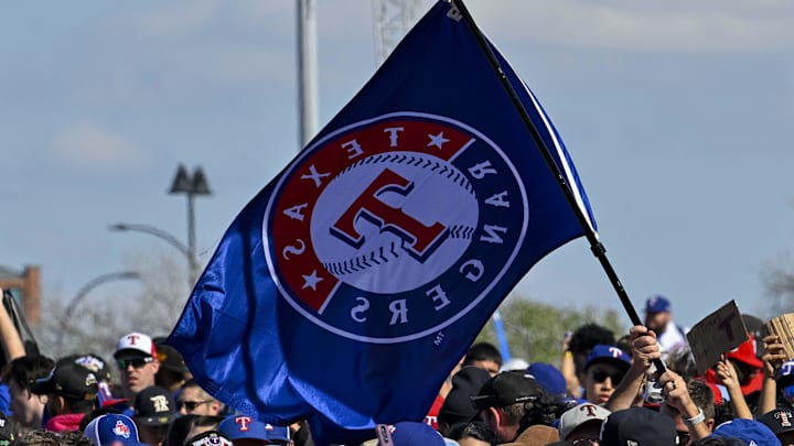 Nov 3, 2023; Arlington, TX, USA; A view of the Texas Rangers fans and flags during the World Series championship parade at Globe Life Field. Mandatory Credit: Jerome Miron-Imagn Images