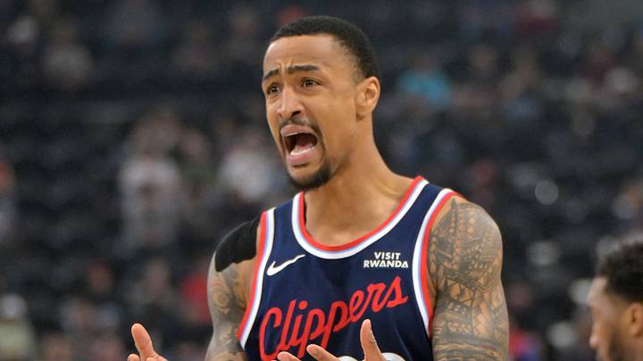 Feb 4, 2026; Inglewood, California, USA; Los Angeles Clippers forward John Collins (20) reacts after he was charged with a foul on Cleveland Cavaliers guard Donovan Mitchell (45) in the first half at Intuit Dome. Mandatory Credit: Jayne Kamin-Oncea-Imagn Images