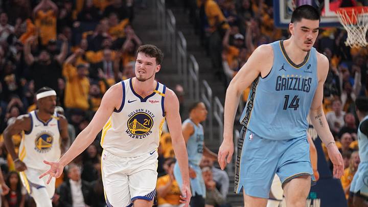 Apr 15, 2025; San Francisco, California, USA; Golden State Warriors center Quinten Post (21) reacts after making a three point basket next to Memphis Grizzlies center Zach Edey (14) in the second quarter at the Chase Center. Mandatory Credit: Cary Edmondson-Imagn Images Apr 15, 2025; San Francisco, California, USA; Golden State Warriors center Quinten Post (21) reacts after making a three point basket next to Memphis Grizzlies center Zach Edey (14) in the second quarter at the Chase Center. Mandatory Credit: Cary Edmondson-Imagn Images