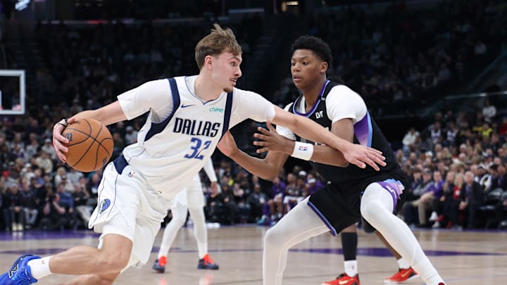 Dec 15, 2025; Salt Lake City, Utah, USA; Dallas Mavericks forward Cooper Flagg (32) drives to the basket against Utah Jazz guard Ace Bailey (19) during the second quarter at Delta Center. Mandatory Credit: Rob Gray-Imagn Images Dec 15, 2025; Salt Lake City, Utah, USA; Dallas Mavericks forward Cooper Flagg (32) drives to the basket against Utah Jazz guard Ace Bailey (19) during the second quarter at Delta Center. Mandatory Credit: Rob Gray-Imagn Images