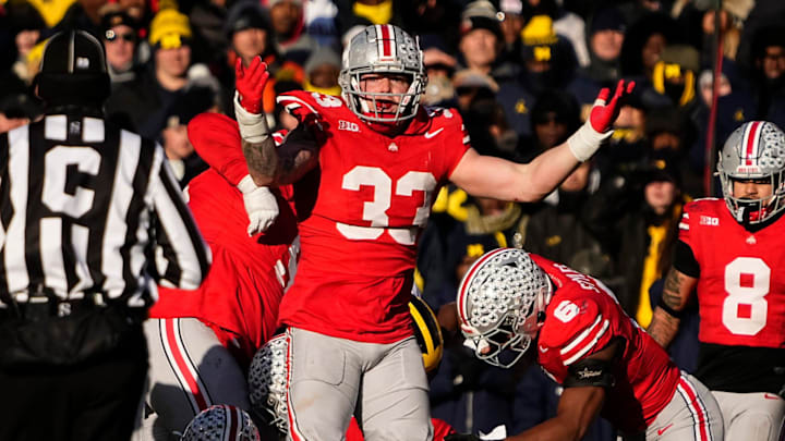 Ohio State Buckeyes defensive end Jack Sawyer (33) appeals for a flag from the official during the second half of the NCAA football game against the Michigan Wolverines at Ohio Stadium in Columbus on Saturday, Nov. 30, 2024. Michigan won 13-10.
