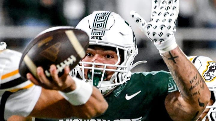 Michigan State's Grady Kelly, right, pressures Western Michigan's Brady Jones, left, during the fourth quarter on Friday, Aug. 29, 2025, in East Lansing. Michigan State's Grady Kelly, right, pressures Western Michigan's Brady Jones, left, during the fourth quarter on Friday, Aug. 29, 2025, in East Lansing.