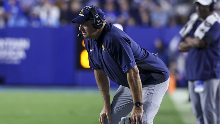 Oct 3, 2025; Provo, Utah, USA; West Virginia Mountaineers head coach Rich Rodriguez looks on during the fourth quarter of the game against the Brigham Young Cougars at LaVell Edwards Stadium. Mandatory Credit: Rob Gray-Imagn Images