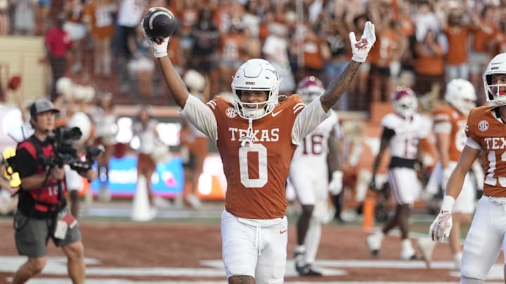 Texas Longhorns wide receiver DeAndre Moore Jr. reacts after making a reception for a touchdown during the second half against the Arkansas Razorbacks at Darrell K Royal-Texas Memorial Stadium. 