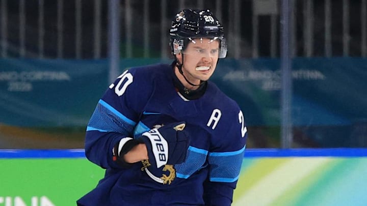 Feb 18, 2026; Milan, Italy; Sebastian Aho of Finland celebrates scoring their first goal against Switzerland in a men's ice hockey quarterfinal during the Milano Cortina 2026 Olympic Winter Games at Milano Rho Ice Hockey Arena. Mandatory Credit: Katie Stratman-Imagn Images Feb 18, 2026; Milan, Italy; Sebastian Aho of Finland celebrates scoring their first goal against Switzerland in a men's ice hockey quarterfinal during the Milano Cortina 2026 Olympic Winter Games at Milano Rho Ice Hockey Arena. Mandatory Credit: Katie Stratman-Imagn Images