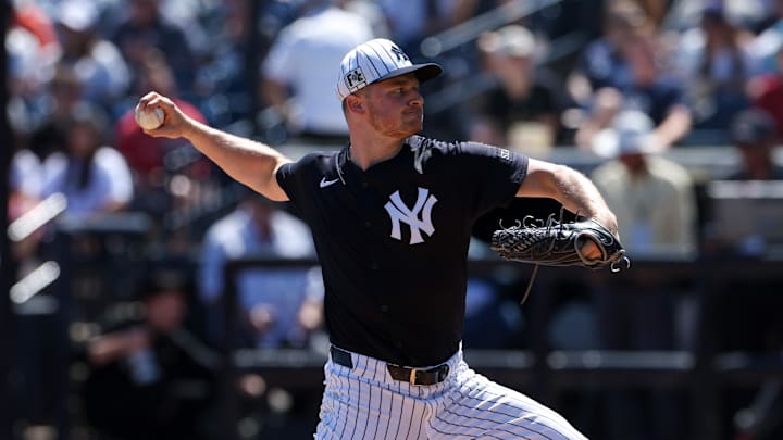 Mar 11, 2025; Tampa, Florida, USA; New York Yankees pitcher Clarke Schmidt (36) throws a pitch against the Baltimore Orioles in the first inning during spring training at George M. Steinbrenner Field. 