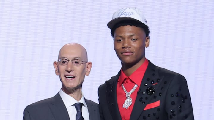 Jun 25, 2025; Brooklyn, NY, USA;  Ace Bailey stands with NBA commissioner Adam Silver after being selected as the fifth pick by the Utah Jazz in the first round of the 2025 NBA Draft at Barclays Center. Mandatory Credit: Brad Penner-Imagn Images