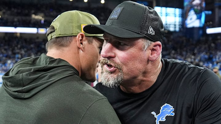Detroit Lions head coach Dan Campbell hugs Minnesota Vikings head coach Kevin O'Connell after 27-24 loss 