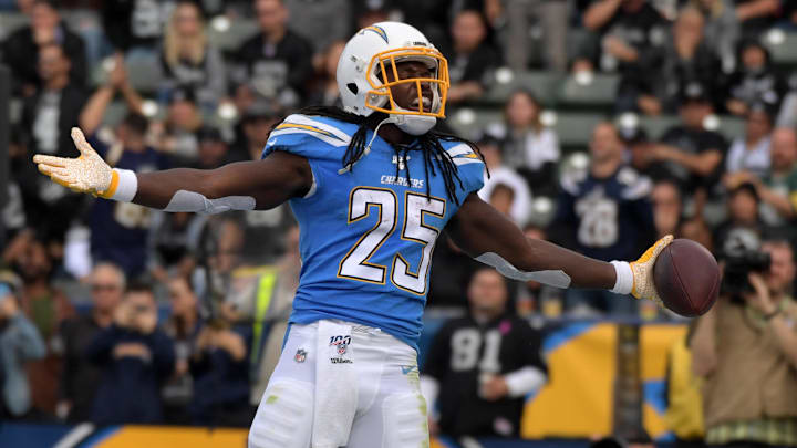 Dec 22, 2019; Carson, California, USA; Los Angeles Chargers running back Melvin Gordon (25) celebrates after scoring on a 1-yard touchdown run in the second quarter against the Oakland Raiders at Dignity Health Sports Park. Mandatory Credit: Kirby Lee-Imagn Images