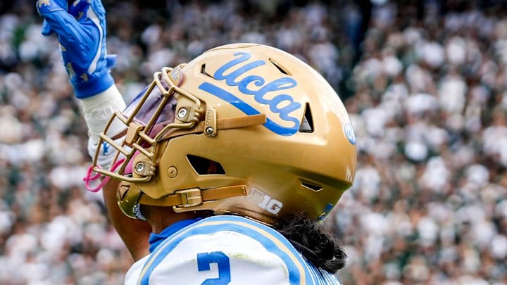 UCLA's Titus Mokiao-Atimalala celebrates his touchdown catch against Michigan State during the second quarter on Saturday, Oct. 11, 2025, at Spartan Stadium in East Lansing. UCLA's Titus Mokiao-Atimalala celebrates his touchdown catch against Michigan State during the second quarter on Saturday, Oct. 11, 2025, at Spartan Stadium in East Lansing.