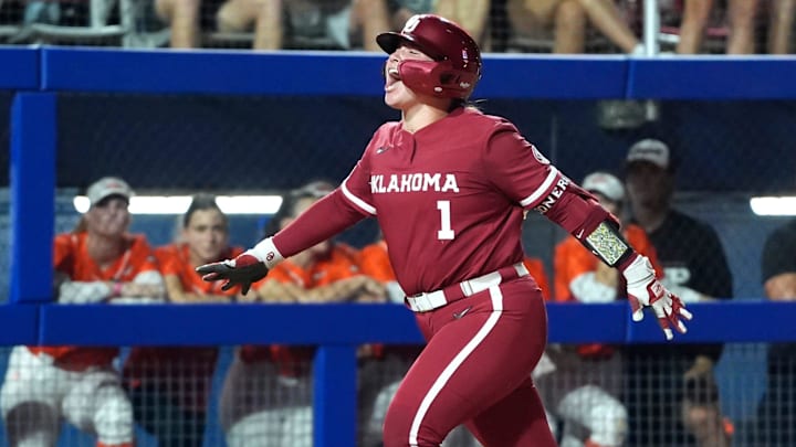 Oklahoma catcher Kendall Wells celebrates after hitting a home run in a Bedlam contest at Devon Park.