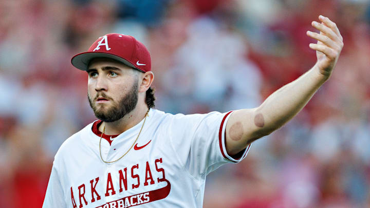 Arkansas Razorback junior left handed pitcher gestures to the crowd after striking out the side in game one of the weekend series against the No. 1 ranked Texas Longhorns at Baum Walker Stadium. 