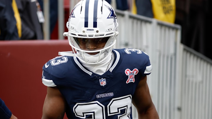 Dallas Cowboys RB Javonte Williams runs onto the field for warmups before the game against the Washington Commanders.