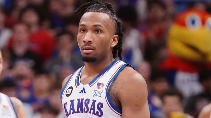 Kansas Jayhawks guard Darryn Peterson (22) enters the court with Kansas Jayhawks guard Tre White (3) and Kansas Jayhawks forward Bryson Tiller (15) during the game against Houston Cougars inside Allen Fieldhouse on Monday, Feb. 23, 2026.