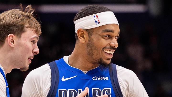 Mar 16, 2026; New Orleans, Louisiana, USA;  Dallas Mavericks forward Cooper Flagg (32) shares a moment with forward P.J. Washington (25) against the New Orleans Pelicans during the first half at Smoothie King Center. Mandatory Credit: Stephen Lew-Imagn Images