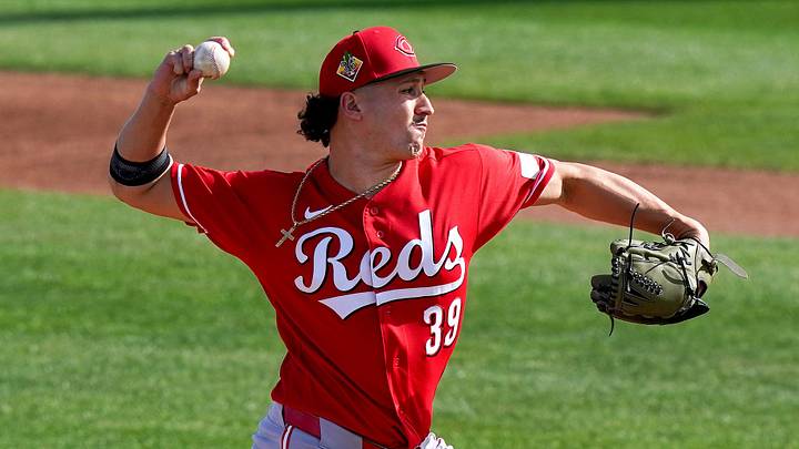 Cincinnati Reds pitcher Julian Aguiar (39) throws a pitch