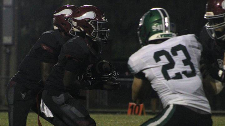 Raines running back TJ Williamson (10) rushes for yardage against Venice during a game on Oct. 2, 2026. Raines won 20-17.