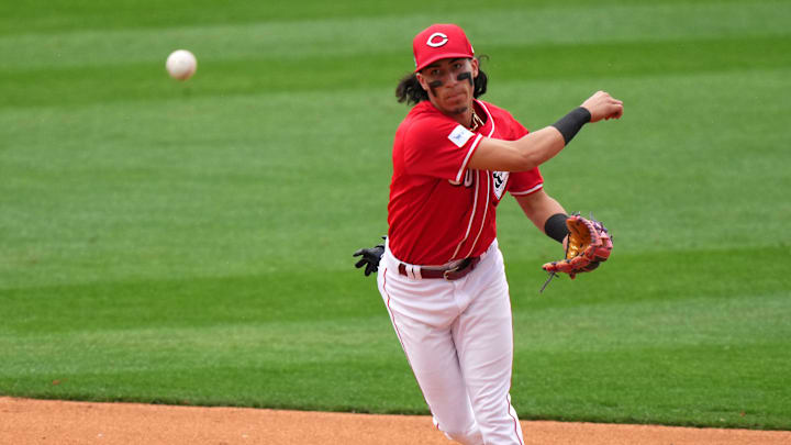 Cincinnati Reds shortstop Edwin Arroyo (80) throws to first base for an out in the eighth inning during a MLB spring training baseball game, Monday, Feb. 26, 2024, at Goodyear Ballpark in Goodyear, Ariz.