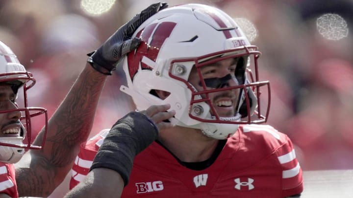 Safety Preston Zachman (14) celebrates against Purdue at Camp Randall Stadium in Madison, Wisconsin. 
