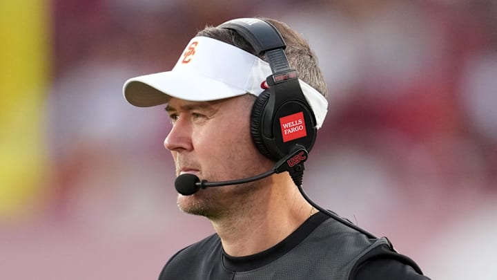 Aug 30, 2025; Los Angeles, California, USA; Southern California Trojans head coach Lincoln Riley watches from the sidelines against the Missouri State Bears in the first half at United Airlines Field at Los Angeles Memorial Coliseum. Mandatory Credit: Kirby Lee-Imagn Images