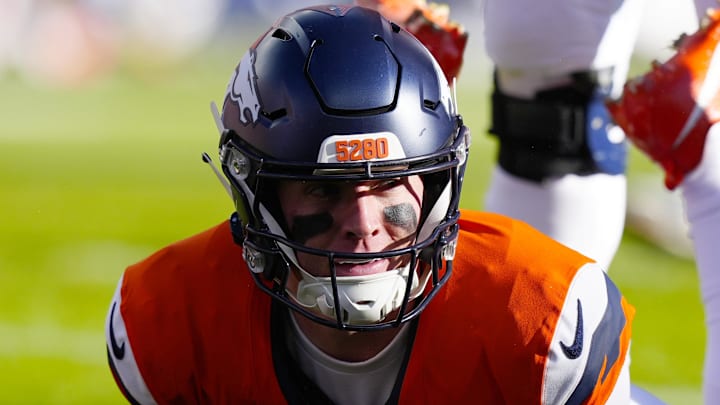 Jan 17, 2026; Denver, CO, USA; Denver Broncos quarterback Bo Nix (10) reacts after a play during the first quarter of an AFC Divisional Round playoff game against the Buffalo Bills at Empower Field at Mile High. Mandatory Credit: Ron Chenoy-Imagn Images