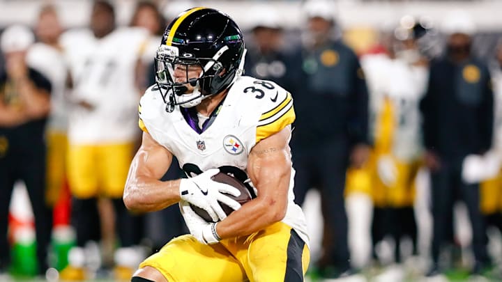 Aug 9, 2025; Jacksonville, Florida, USA; Pittsburgh Steelers running back Evan Hull (38) runs the ball against the Jacksonville Jaguars during a preseason game at EverBank Stadium. Mandatory Credit: Travis Register-Imagn Images