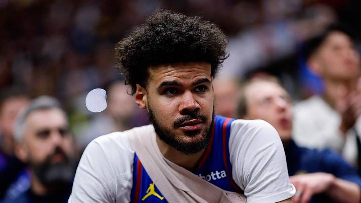 Mar 29, 2026; Denver, Colorado, USA; Denver Nuggets forward Cameron Johnson (23) on the bench in the fourth quarter against the Golden State Warriors at Ball Arena. Mandatory Credit: Isaiah J. Downing-Imagn Images