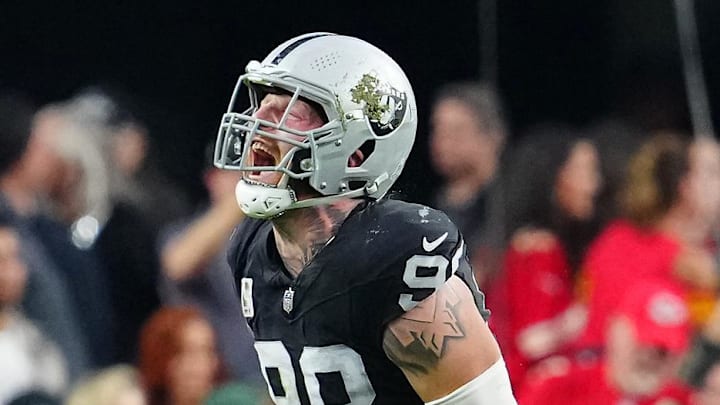 Nov 26, 2023; Paradise, Nevada, USA; Las Vegas Raiders defensive end Maxx Crosby (98) celebrates after sacking Kansas City Chiefs quarterback Patrick Mahomes (15) during the third quarter at Allegiant Stadium. Mandatory Credit: Stephen R. Sylvanie-Imagn Images