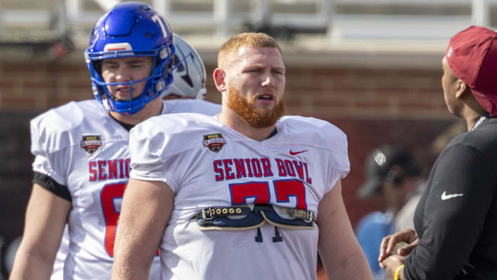 Jan 29, 2026; Mobile, AL, USA; National offensive lineman Keylan Rutledge (77) of Georgia Tech takes a breather during National Senior Bowl practice at Hancock Whitney Stadium. Mandatory Credit: Vasha Hunt-Imagn Images
