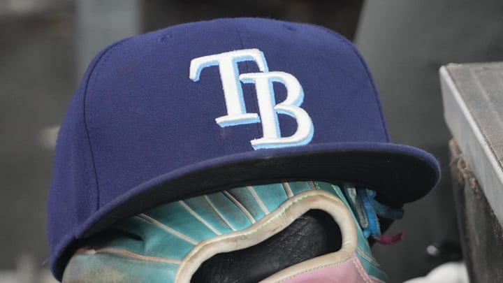 Sep 26, 2025; Toronto, Ontario, CAN; The hat and glove of Tampa Bay Rays third baseman Junior Caminero (13) in the dugout during the game against the Toronto Blue Jays at Rogers Centre. Sep 26, 2025; Toronto, Ontario, CAN; The hat and glove of Tampa Bay Rays third baseman Junior Caminero (13) in the dugout during the game against the Toronto Blue Jays at Rogers Centre.
