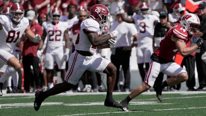 Alabama running back Jam Miller (26) scores a touchdown on a 34-yard run during the third quarter of their game Saturday, September 14, 2024 at Camp Randall Stadium in Madison, Wisconsin. Alabama beat Wisconsin 42-10.