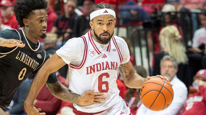 Indiana's Tayton Conerway (6) drives on Lindenwood's Mekhi Cooper (0) at Simon Skjodt Assembly Hall on Thursday, Nov. 20, 2025. Indiana's Tayton Conerway (6) drives on Lindenwood's Mekhi Cooper (0) at Simon Skjodt Assembly Hall on Thursday, Nov. 20, 2025.