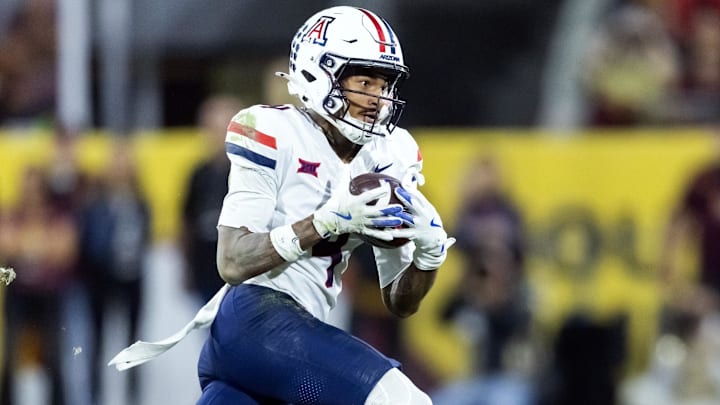 Nov 28, 2025; Tempe, Arizona, USA; Arizona Wildcats wide receiver Kris Hutson (4) against the Arizona State Sun Devils during the 99th Territorial Cup at Mountain America Stadium. Mandatory Credit: Mark J. Rebilas-Imagn Images