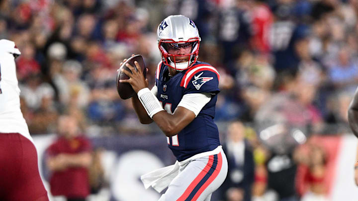 Aug 8, 2025; Foxborough, Massachusetts, USA; New England Patriots quarterback Joshua Dobbs (11) looks to pass against the Washington Commanders during the first half at Gillette Stadium. Mandatory Credit: Brian Fluharty-Imagn Images
