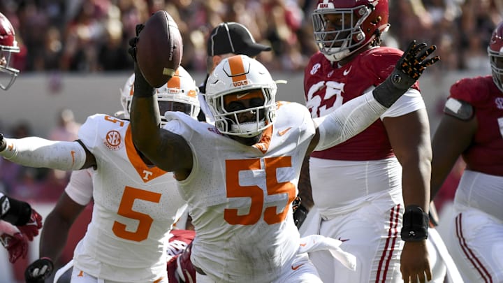 Oct 21, 2023; Tuscaloosa, Alabama, USA; Tennessee Volunteers defensive lineman Omarr Norman-Lott (55) celebrates after receiving a fumble by Alabama Crimson Tide quarterback Jalen Milroe (4) at Bryant-Denny Stadium. Mandatory Credit: Gary Cosby Jr.-Imagn Images