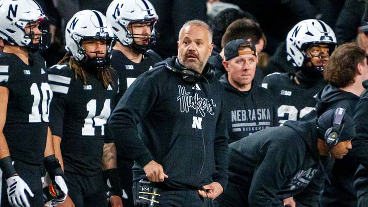Nebraska head coach Matt Rhule on the sideline with his players in their Blackout game last season against USC. The 2025 Huskers ended under their projected regular-season win total with seven. Nebraska head coach Matt Rhule on the sideline with his players in their Blackout game last season against USC. The 2025 Huskers ended under their projected regular-season win total with seven.