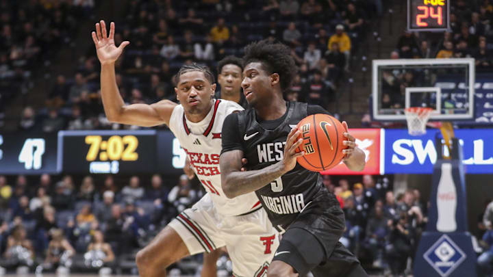 Feb 8, 2026; Morgantown, West Virginia, USA; West Virginia Mountaineers guard Honor Huff (3) drives against Texas Tech Red Raiders guard Jaylen Petty (11) during the second half at Hope Coliseum. Mandatory Credit: Ben Queen-Imagn Images Feb 8, 2026; Morgantown, West Virginia, USA; West Virginia Mountaineers guard Honor Huff (3) drives against Texas Tech Red Raiders guard Jaylen Petty (11) during the second half at Hope Coliseum. Mandatory Credit: Ben Queen-Imagn Images