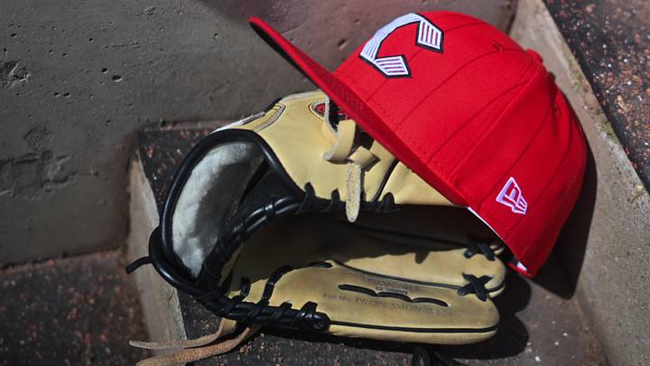 Apr 11, 2026; Cincinnati, Ohio, USA;  A view of an official Cincinnati Reds hat on the dugout steps during the game against the Los Angeles Angels at Great American Ball Park. Mandatory Credit: Aaron Doster-Imagn Images