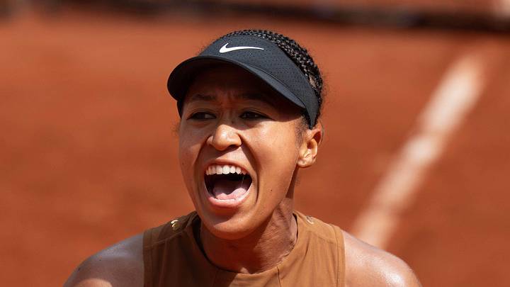 Naomi Osaka reacts during her match