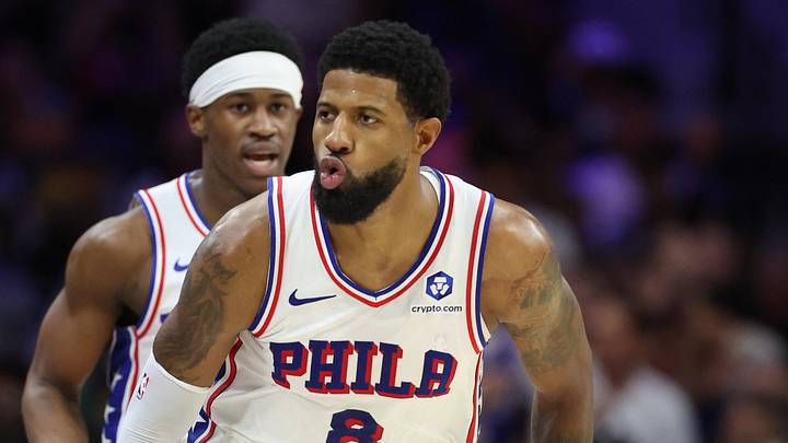 Philadelphia 76ers forward Paul George (8) reacts to his score against the Boston Celtics during the second quarter at Xfinity Mobile Arena. 