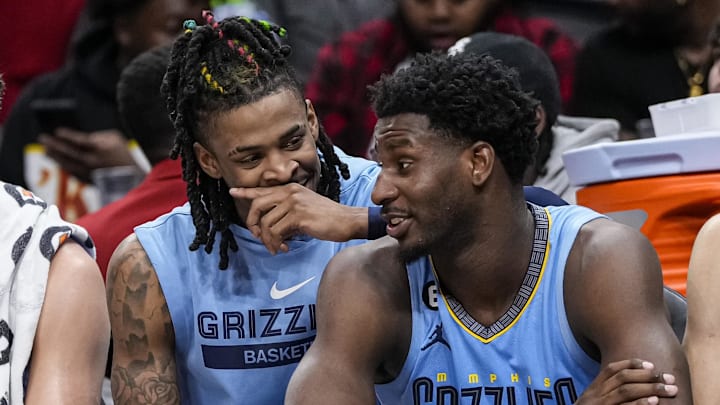 Mar 26, 2023; Atlanta, Georgia, USA; Memphis Grizzlies guard Ja Morant (12) and forward Jaren Jackson Jr. (13) react ons the bench during the game against the Atlanta Hawks during the second half at State Farm Arena. Mandatory Credit: Dale Zanine-Imagn Images