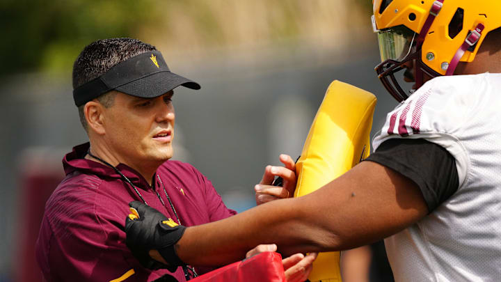 ASU defensive coordinator Brian Ward works with his team during a spring practice at the Kajikawa practice fields in Tempe on March 14, 2023.

Football Asu Spring