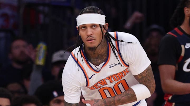 Dec 25, 2025; New York, New York, USA; New York Knicks guard Jordan Clarkson (00) reacts after makes a three point basket during the first half against the Cleveland Cavaliers at Madison Square Garden. Mandatory Credit: Vincent Carchietta-Imagn Images