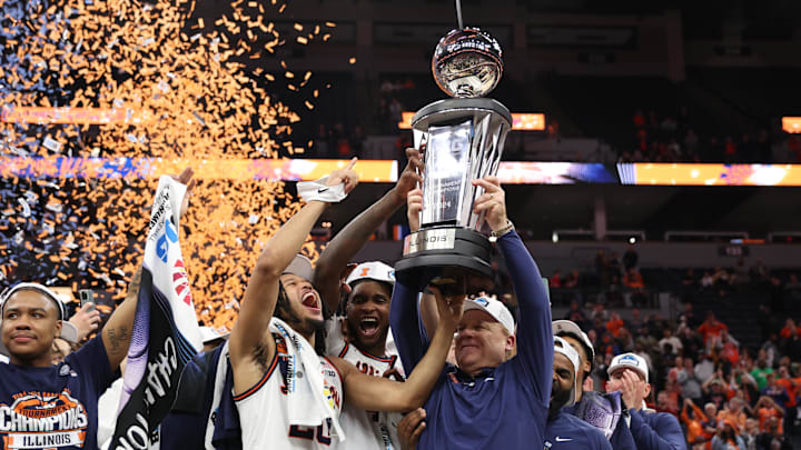 Mar 17, 2024; Minneapolis, MN, USA; Illinois Fighting Illini  head coach Brad Underwood celebrates with forward Ty Rodgers (20) after defeating Wisconsin Badgers at Target Center. Mandatory Credit: Matt Krohn-Imagn Images